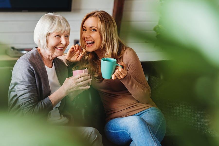 Mother and Daughter Drinking Coffee